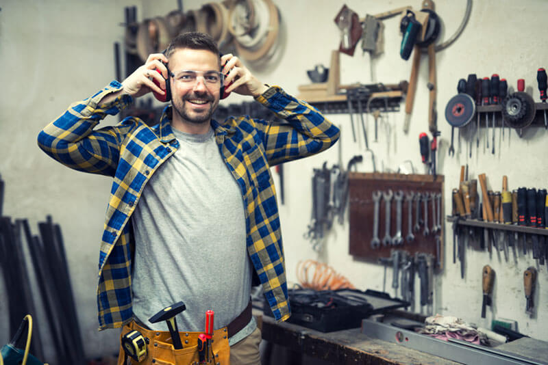 carpenter-workshop-putting-ears-protection-getting-ready-work